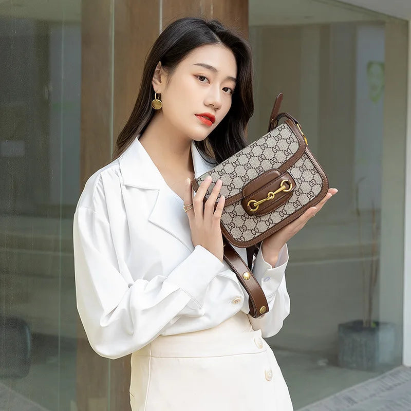 Ladies genuine leather saddle bag, single shoulder bag underarm bag, new fashion versatile niche trend crossbody bag.